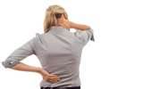 Woman in Pain holding her Lower Back and Neck